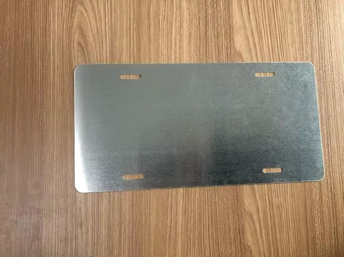 Assman Geprägtes Blechschild Seinfeld als Metall-Wanddekoration in Silber, B: 30,0 cm, H: 15,2 cm - Bild 1