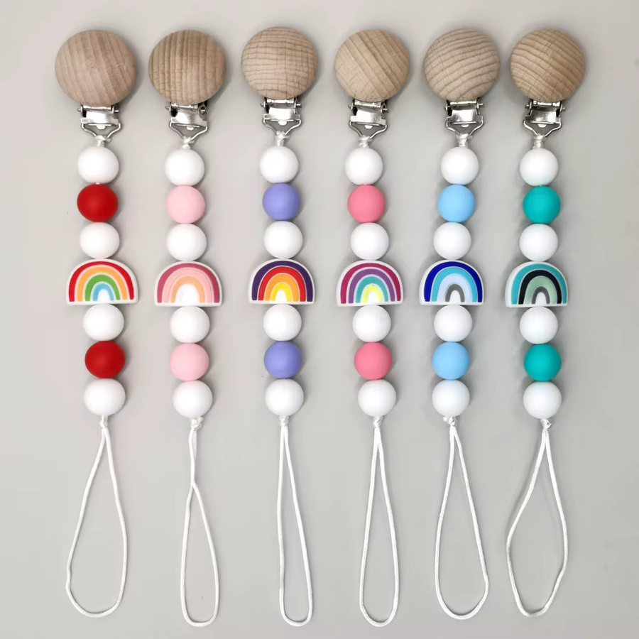 Panplay Schnullerclip für Babys mit Silikon-Regenbogenperlen und Buchenholz in Mehrfarbig - Bild 2