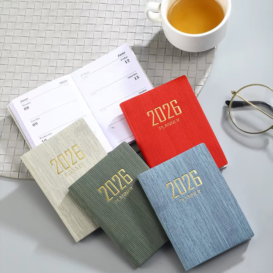 HUALIWEN Planbuch 2026 in Weiß, A7 Wochenkalender und Tagesplaner als kompaktes Softcover-Taschenbuch - Bild 2