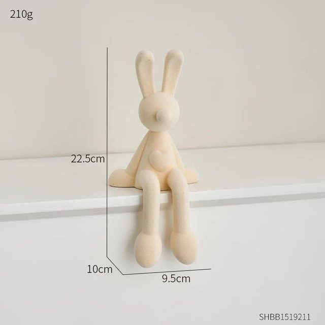 Moderne Kaninchen Figur in Beige als minimalistische Bunny Statue aus Harz für deine Tischdekoration und Wohnraumgestaltung - Bild 1