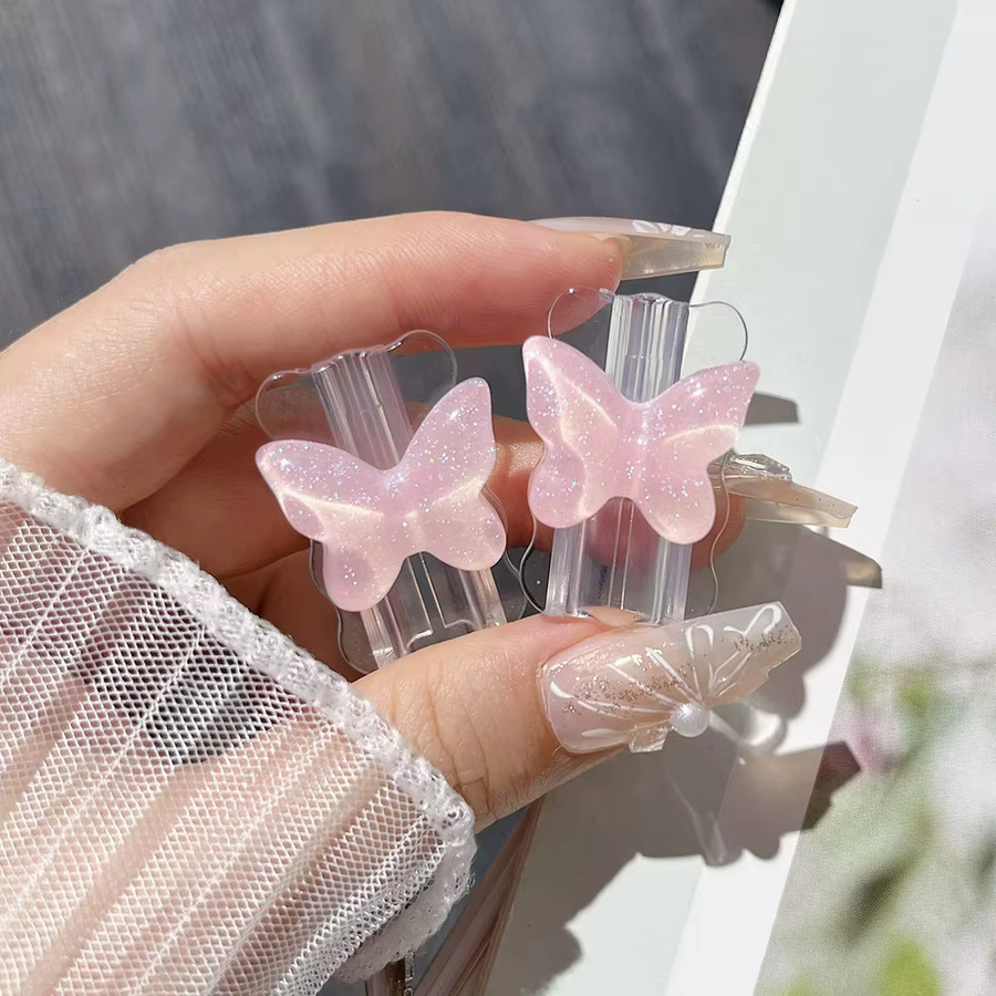 TAOYUNXI Schutzhülle für iPhone Ladegeräte mit Schmetterlings-Design in Rosa inklusive Kabelwickler - Bild 2