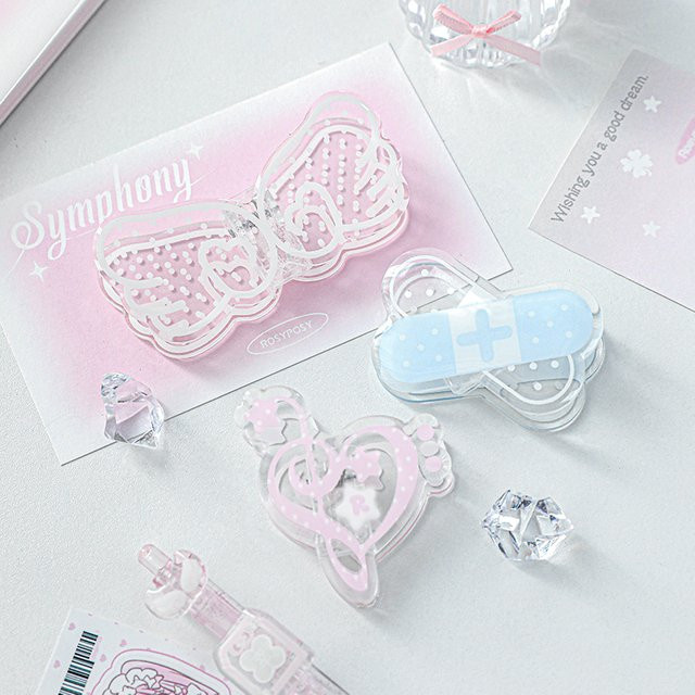 Kawaii Musiknote mit Flügeln Lesezeichen aus Acryl als kreative Buchklammer und Lesehilfe - Bild 1