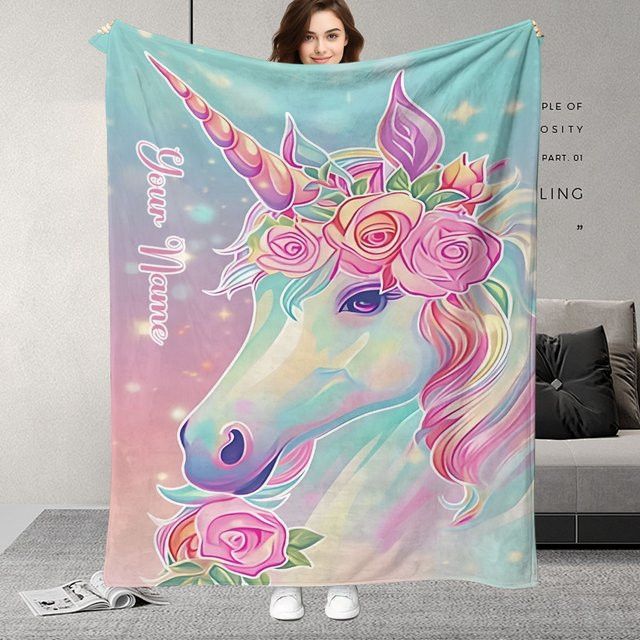 Personalisierte ZIZ Decke mit Namen und Einhornmuster in Rosa und Blau - Bild 1