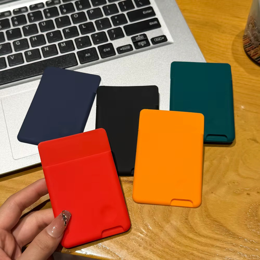 Selbstklebende Silikon-Tasche in Orange für Handy, Geldbörse und Kartenhalter - Bild 3