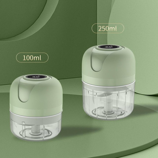 OutsideWorld Elektrischer Knoblauchhacker Kabellos und Tragbar in Grün mit Edelstahlklingen und abnehmbarem Design für Ingwer und Zwiebeln - Bild 1