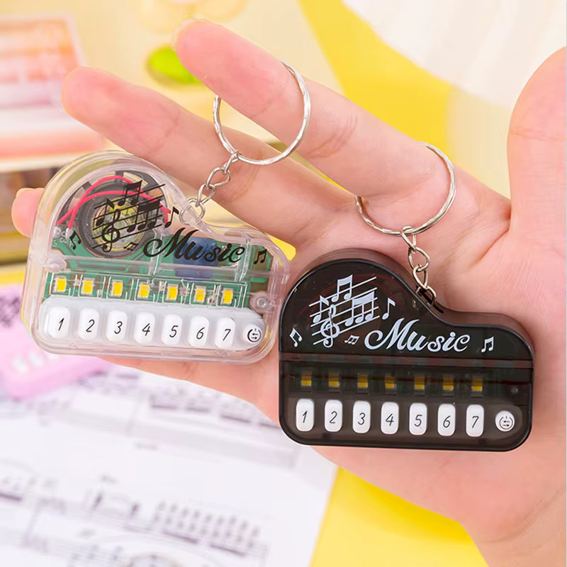 XDR Mini-Elektronisches Klavier Schlüsselanhänger, Leuchtendes Musikspielzeug, 1-teiliges Set - Bild 2