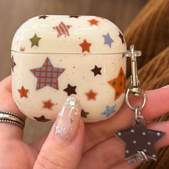 Bunte Sterne Cartoon Kopfhörerhülle mit Bluetooth-Ladebox und Anhänger für Apple AirPods 1, 3, Pro 2 und 2.4 in Multicolour - Bild 1