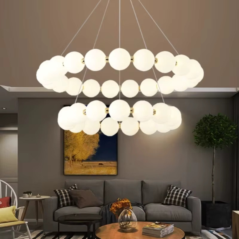 TAONUANSHU LED Kronleuchter im minimalistischen Ring-Design aus Glas und Metall in Beige und Weiß mit Gold/Messing-Akzenten für Wohnzimmer und Esszimmer - Bild 2