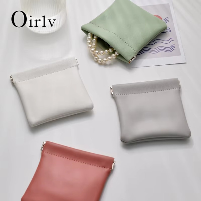 Oirlv Schmucktasche aus Leder zur Aufbewahrung von Halsketten, Ringen, Armbändern und Ohrringen mit Druckknopfverschluss - Bild 1