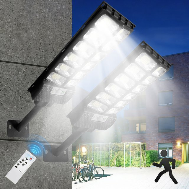 UMEXUS 2er Set LED Solarlampen für Außenbereich mit Bewegungssensor, IP65 wasserdichte Solar-Wandleuchte für Garten und Hof, Schwarz - Bild 1