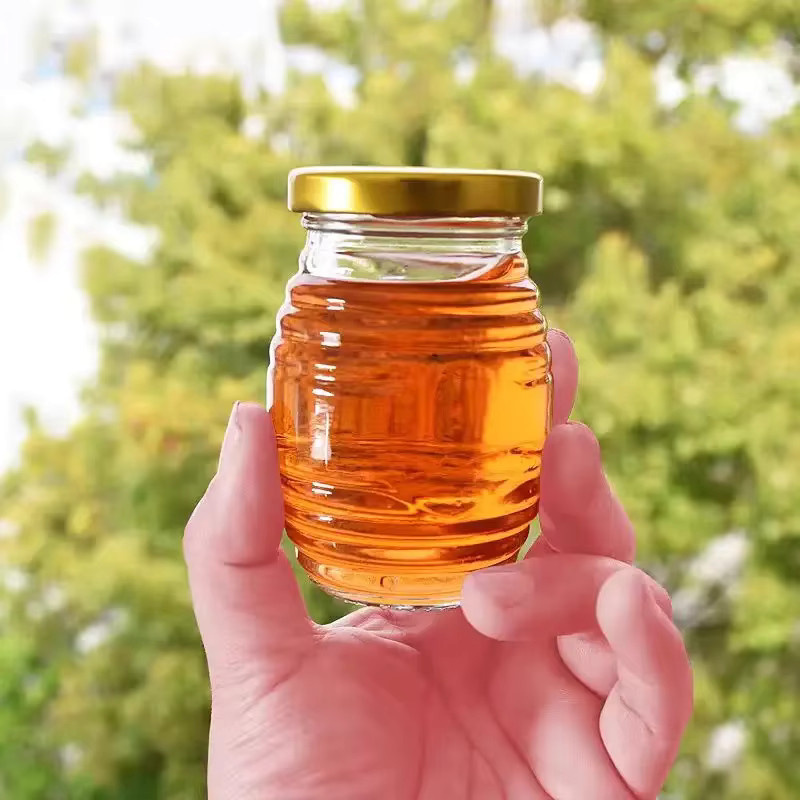 Mini-Glas-Honiggläser-Set aus transparentem Glas mit Golddeckeln und Zubehör, inklusive Holz-Dipperstäbchen und Bienenfiguren, 70 ml - Bild 3
