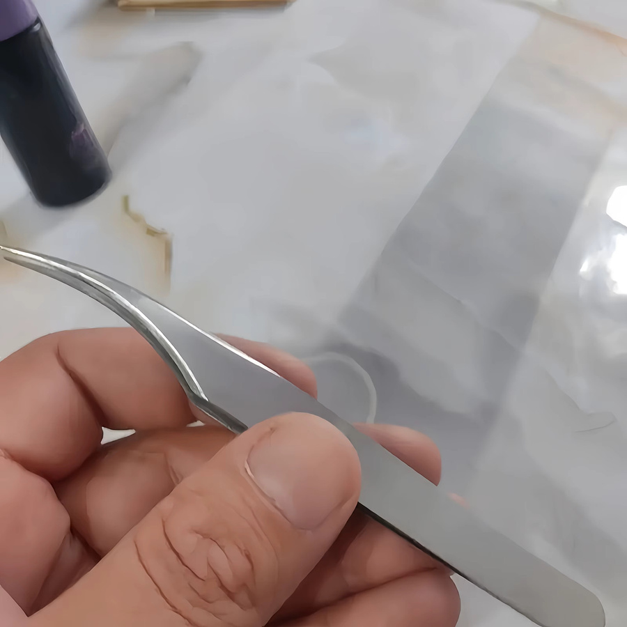 Ouriner Wimpernpinzette aus Edelstahl, silbern, gebogenes Design - Bild 2