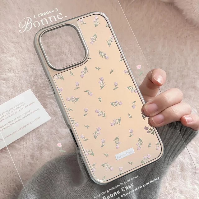 MUQGEW Handyhülle mit rosa Blumen-Design und Make-up-Spiegel für iPhone, kompatibel mit iPhone 17 bis 12 Pro Max, inklusive Kette und stoßfester Hartschale - Bild 1