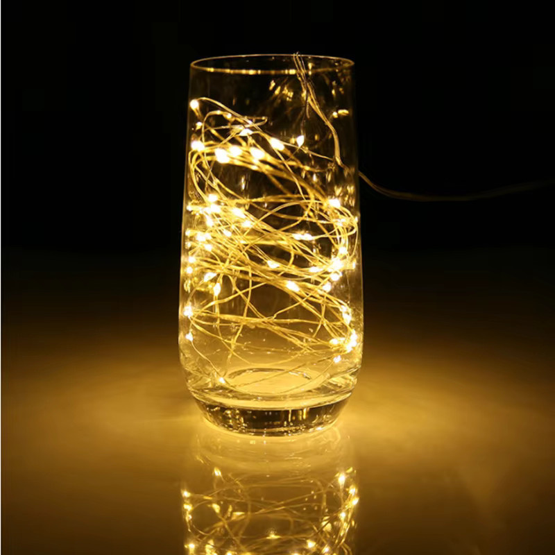 Wasserdichte LED Lichterkette mit Knopfzellen in Warmweiß für Garten, Weihnachten und Dekoration - Bild 1