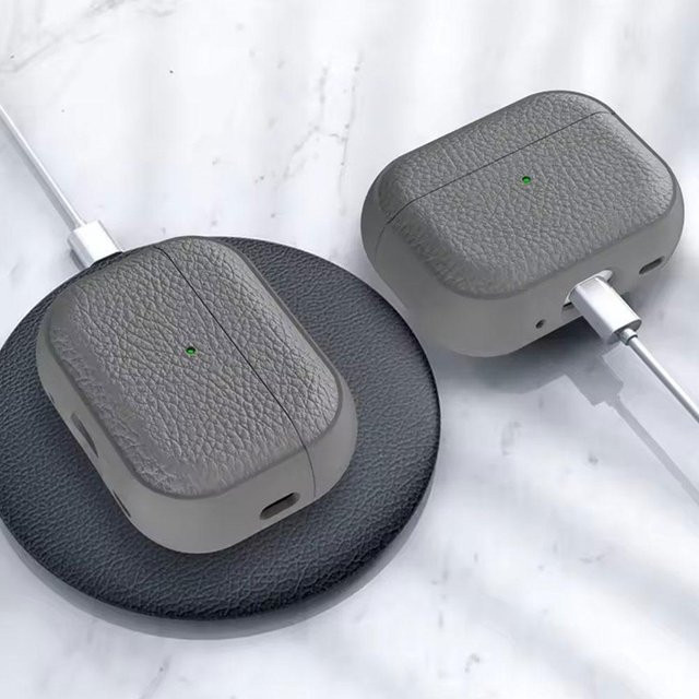 Apple AirPods Pro 3 Schutzhülle aus weichem TPU-Litschi-Leder in Weiß mit Trageband - Bild 1