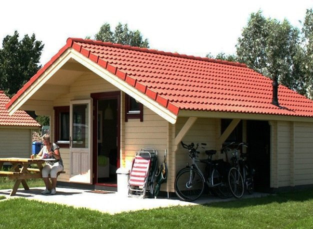 Holzhaus Ferienhaus Blockhaus Yale von Holzhaus Ferienhäuser mit einer Fläche von 5.72 x 4.97 x 6.08 m und 50 mm Wandstärke - Bild 1