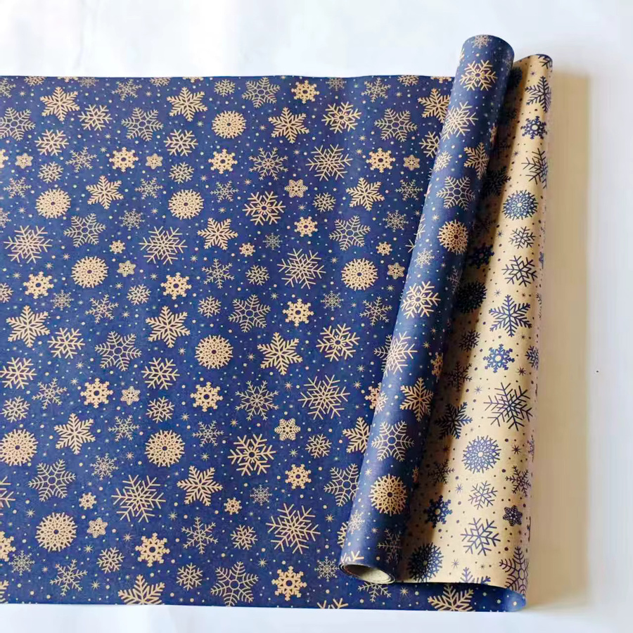 Dunkelblaue Schneeflocken Geschenkpapierrolle aus Kraftpapier mit doppelseitigem Winterdesign - Bild 3