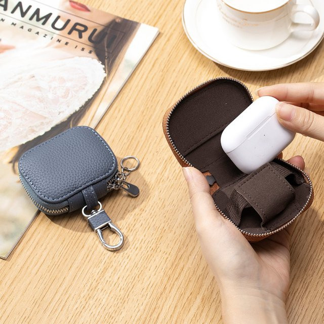Schlüsseltasche aus echtem Leder in Schwarz mit Taillen-Aufhängung und Schutzhülle für Apple Bluetooth-Kopfhörer - Bild 1