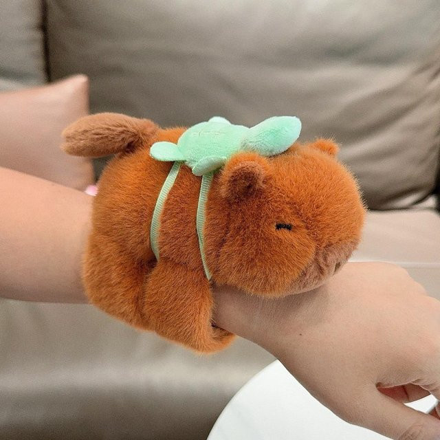 Yiran Health & Beauty Capybara Plüschtier Klatscharmband, ab 3 Jahre - Bild 1