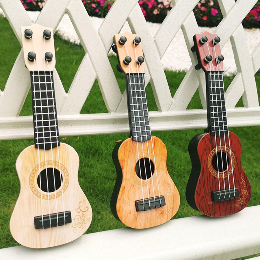 Kidsly Mini 4 Saiten Klassische Ukulele Gitarre Spielzeug - Bild 3