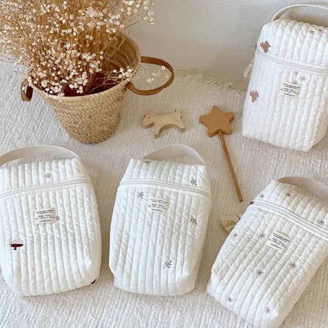 DANIVIVI Tragbare Wickeltasche mit Stickerei als Baby Organizer und Kinderwagen-Organizer in Weiß - Bild 1