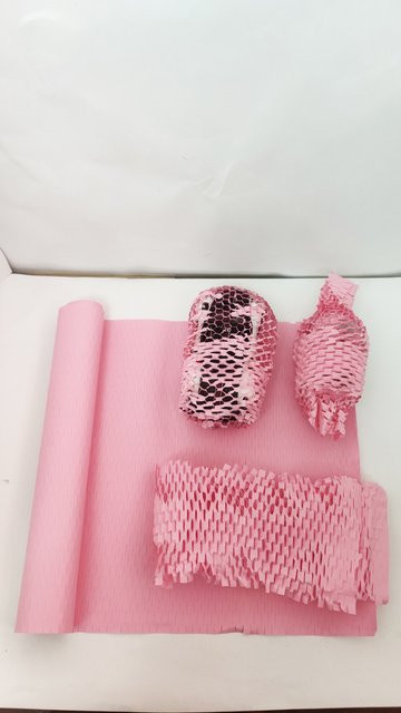 Rosa Wabenpapier als stoßfestes Füllmaterial für Geschenkboxen und Obstverpackungen - Bild 1