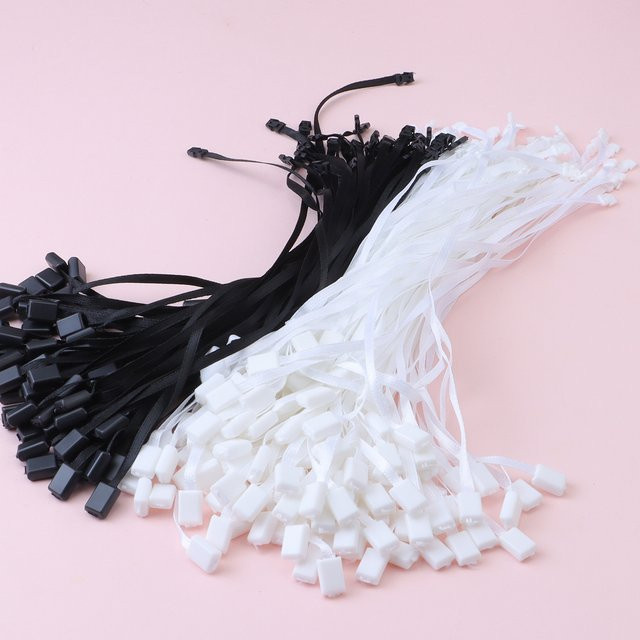 100 Stück Anhänger-Verschlüsse aus Polyester mit Snap Lock Pin und Loop in Weiß und Schwarz für Kleidung, Taschen und Etiketten als DIY Nähzubehör - Bild 1