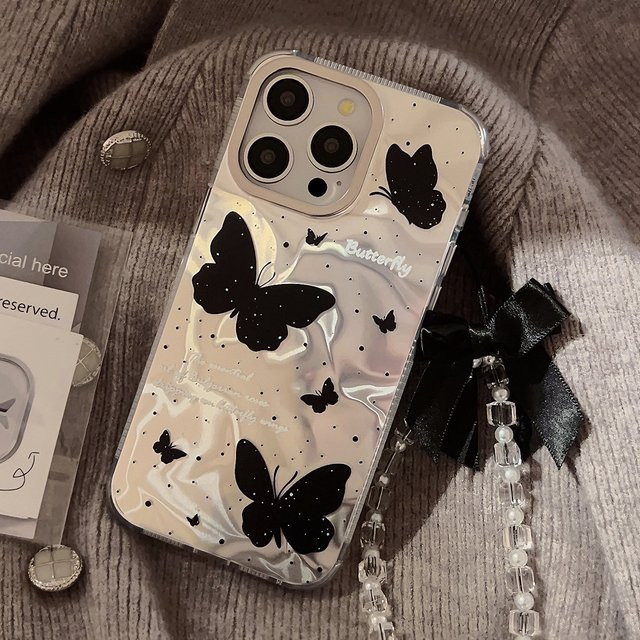 MUQGEW Stoßfeste iPhone Schutzhülle mit Schmetterlings-Wasserwellen-Design und Umhängeband in Schwarz und Transparent für iPhone 16 15 14 Plus 13 12 Pro Max - Bild 1