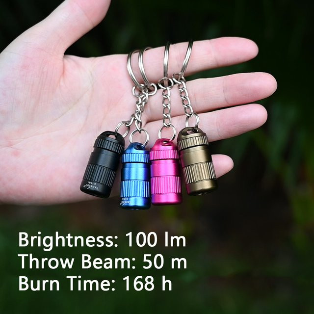 TANK007 E15 Mini LED Taschenlampe mit Knopfzellen, IPX7 wasserdicht und robustes Metalldesign in Blau - Bild 1