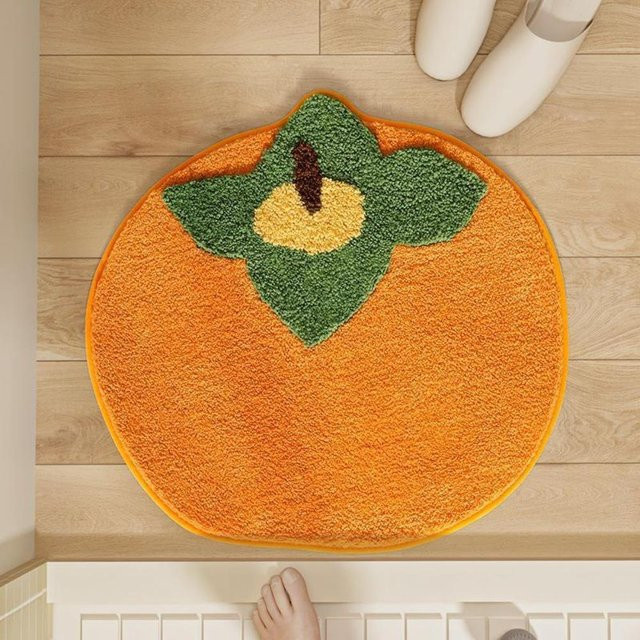 Saugfähiger Badezimmerteppich von yiluwhc in Orange mit Frucht-Design und Rundform - Bild 1