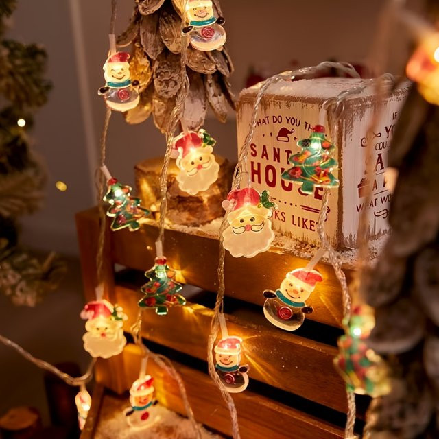 Batteriebetriebene LED Lichterkette mit bunten Weihnachtsfiguren wie Weihnachtsmann, Schneemann und Elch für deine Weihnachtsdekoration und Partys - Bild 1