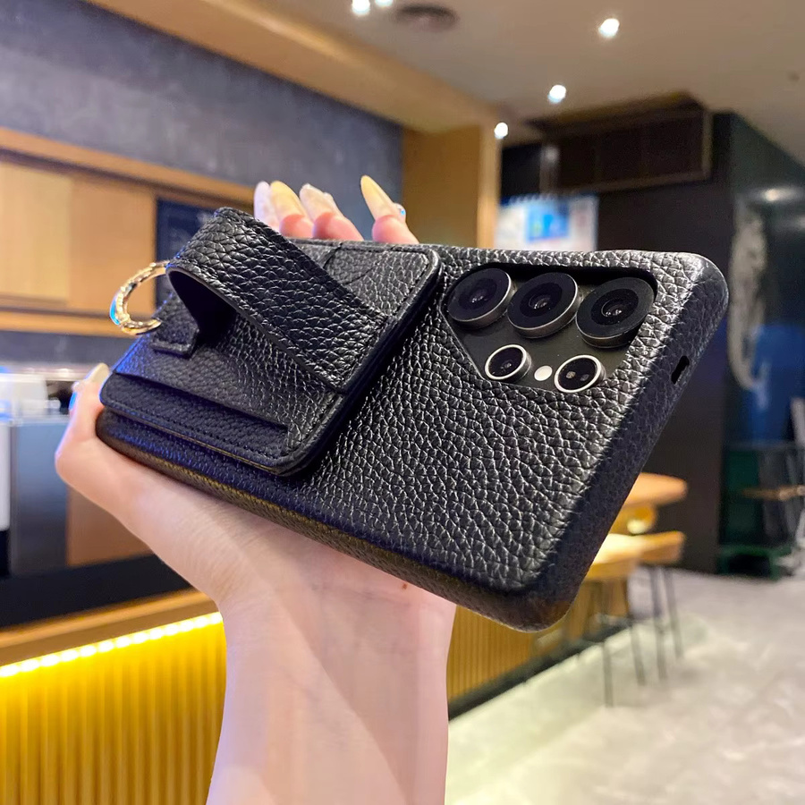Samsung Handyhülle aus PU Leder mit Litschi-Muster und Kartenhalter sowie Handgelenkstrap in Schwarz für Galaxy S25U S20U S22 A15 A56 A06 - Bild 2