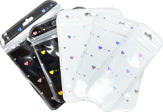 50 Stück wiederverschließbare Mylar-Beutel mit Schwarz-Weiß-Laserherz-Design und Reißverschluss zur Lebensmittelaufbewahrung und Verpackung, Schwarz-Weiß - Bild 1