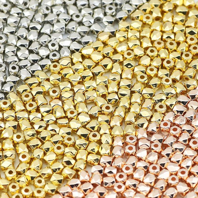 Distanzperlen Gold versilbert, facettiert, polygonal, 4 mm, Unisex - Bild 1