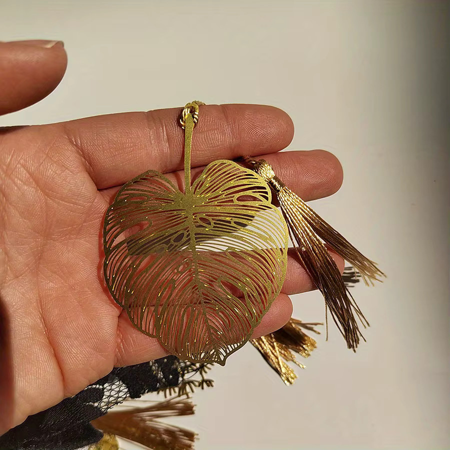 TWBEB Lesezeichen-Set aus Metall in Gold mit 4 bis 16 Motiven wie Nelke, Löwenzahn, Sonnenblume, Schildkröte und Bambus - Bild 3