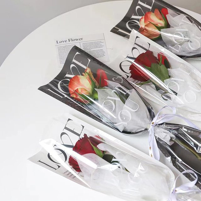 20 Stück Transparente Rosenverpackungsbeutel aus Kunststoff mit LOVE-Aufdruck für Blumensträuße und Geschenke in Blau - Bild 1