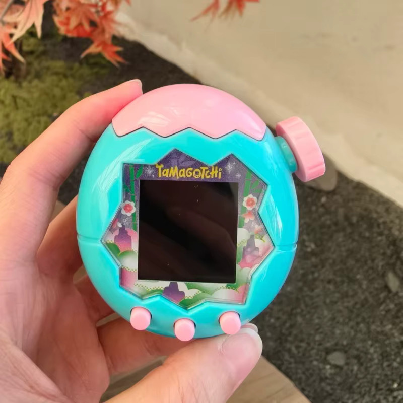 Bandai Tamagotchi Paradise Joy Park Emerald Forest Edition, elektronisches Haustierspielgerät - Bild 2