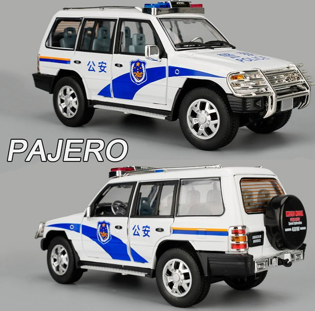 RMZ city Mitsubishi Pajero Modellauto, 1:18, Polizei, Metall, mit Rückziehfunktion, öffnende Türen - Bild 1