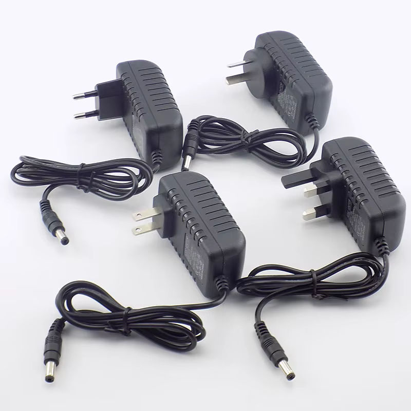 AC DC Netzteil Adapter 12V 2A 2000mA mit EU UK AU US Stecker für LED Streifen und Lampen, Anschluss 5,5mm x 2,5mm - Bild 2