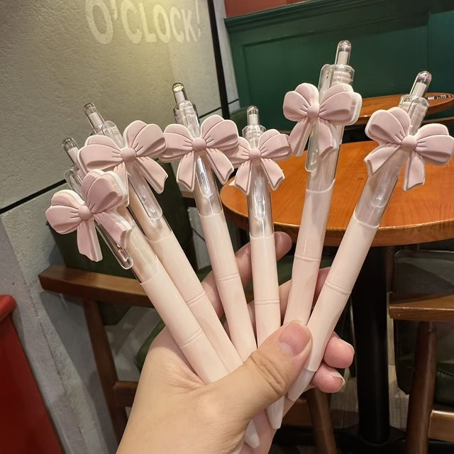 10 Stück rosa Gelstifte mit Schleifenknoten-Design als Klick-Kugelschreiber - Bild 1