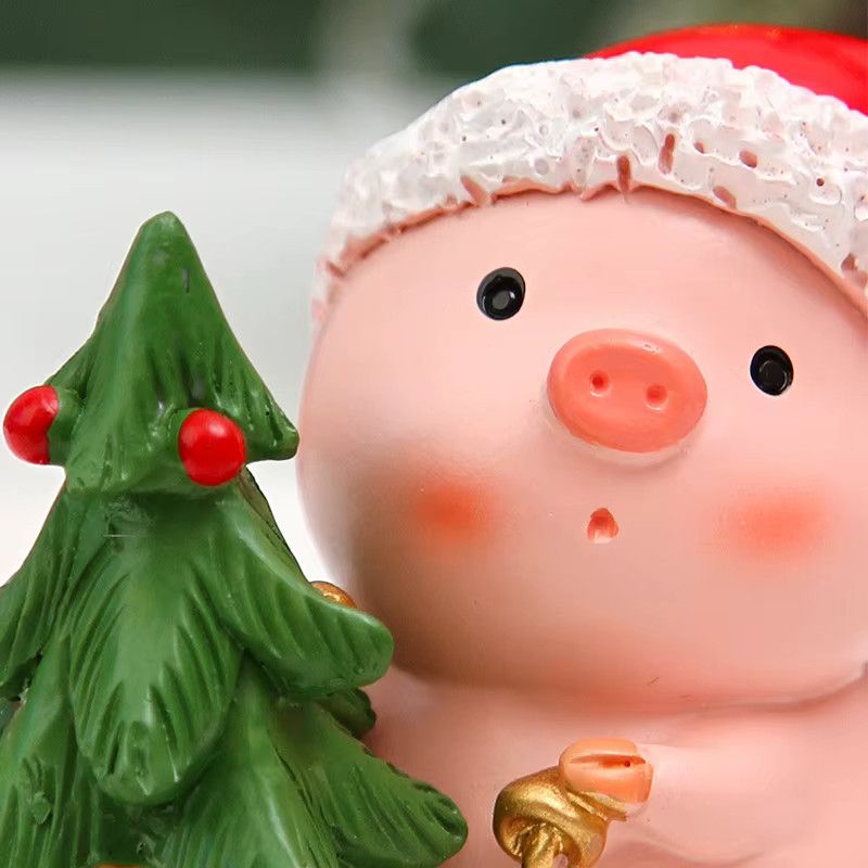 Kreative Weihnachtsdekoration aus Harz in Form eines rosa Schweins mit Weihnachtsbaum als Tischdekoration - Bild 5