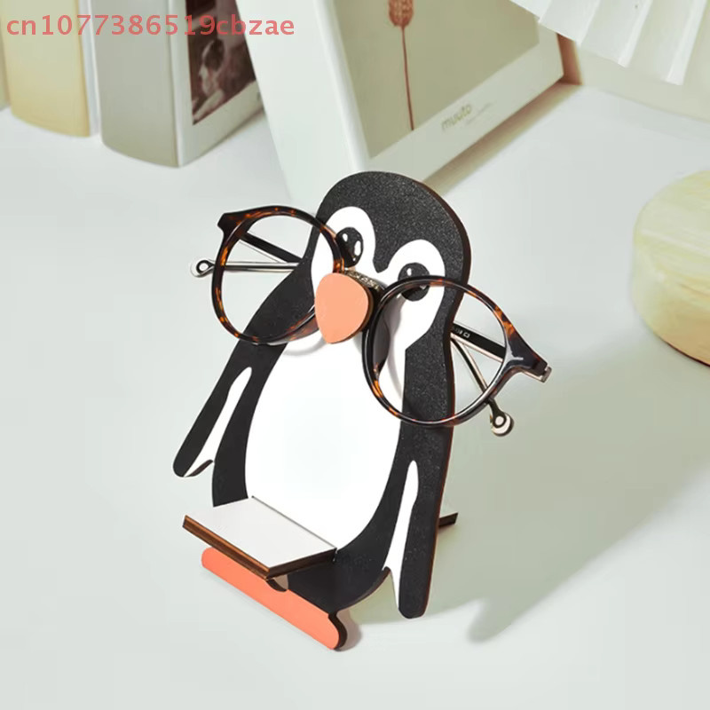 Handgeschnitzter Tier-Ausstellungsständer aus Holz mit Pinguinen und Faultieren als Handyhalter und Deko-Objekt - Bild 4
