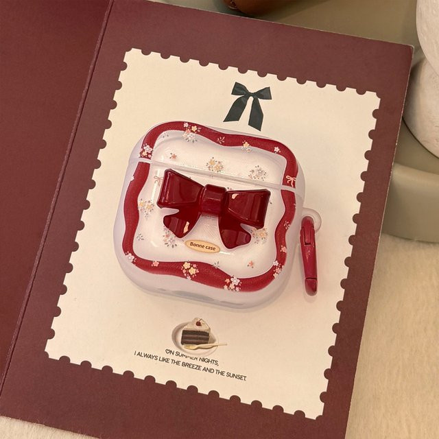 Schutzhülle für Apple AirPods und AirPods Pro mit 3D Cartoon Rote Schleife und Floral Welle Design in Rot inklusive Haken - Bild 1
