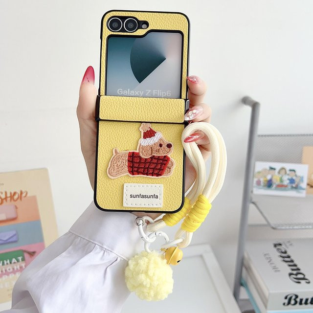 Samsung Galaxy Z Flip 6 5 4 3 Schutzhülle aus PU-Leder mit Cartoon-Motiv und Handschlaufe in Gelb - Bild 1
