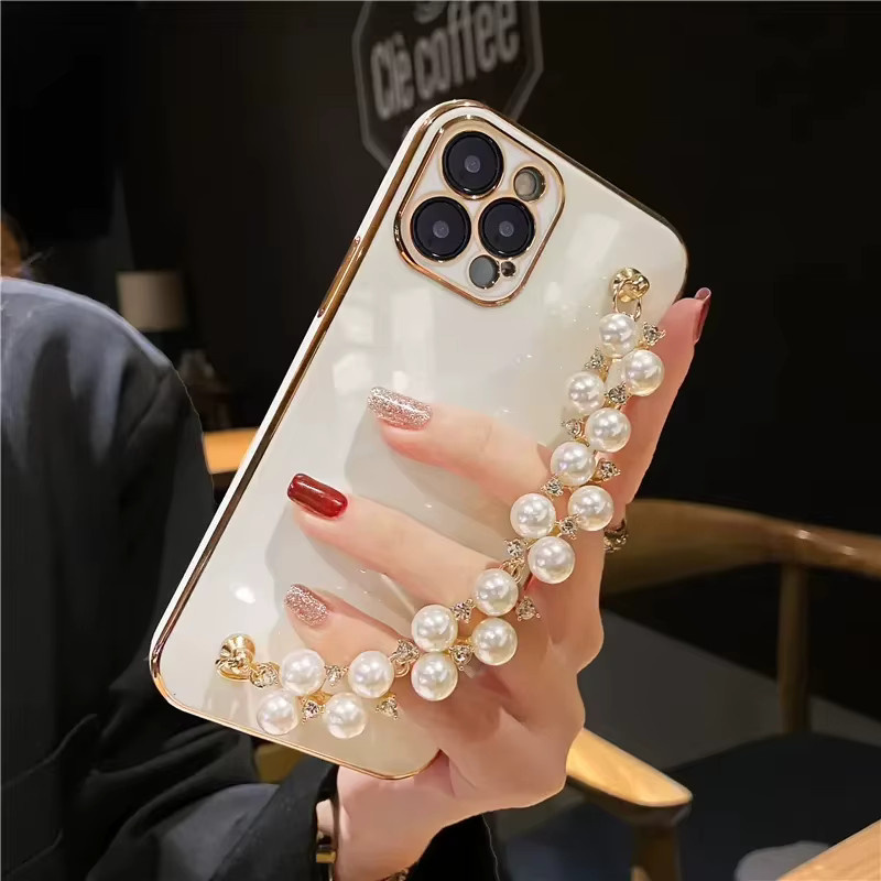 Luxus Perlenarmband Handyhülle für iPhone 11 bis 16 Pro Max, Sturzsicheres Cover mit Perlenarmband in Rot oder Weiß von VNTK - Bild 1