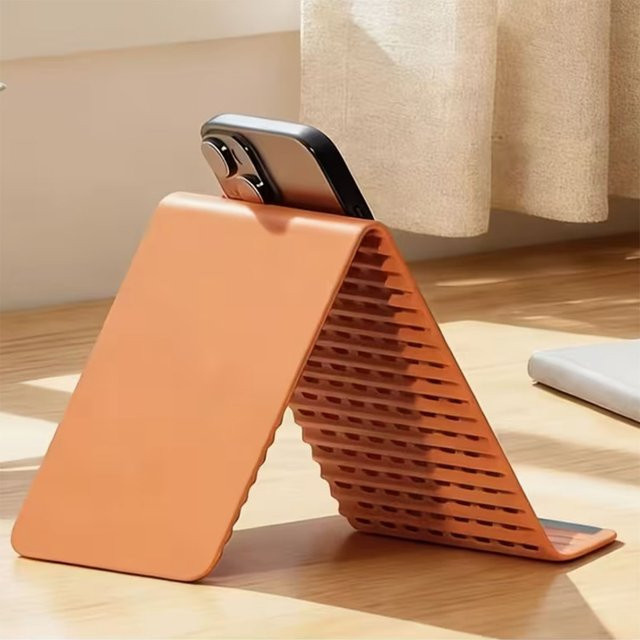 DUTRIEUX Magic Stand Faltbarer Mehrschichtiger Telefon und Tablet Halter in Orange mit Silikon und Aluminium für Tischmontage oder Hängung - Bild 1