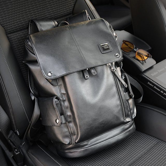 FANNYYEE Lederrucksack für Herren in Schwarz mit USB-C Anschluss und Fach für 14-Zoll-Laptop - Bild 1