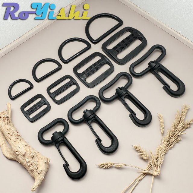 RoYishi Kunststoff-Gürtelschnallen-Set in Schwarz, 15 Stück, Set mit D-Ring-Schnallen, rechteckigen Schiebe-Einstellschnallen und drehbaren Hakenschnallen für 20–38 mm Breite - Bild 1