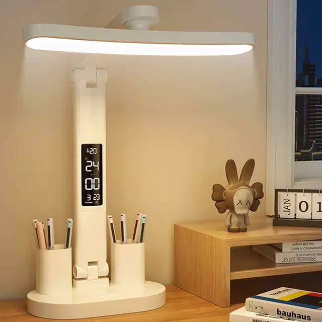 Dimmbare LED Tischlampe mit Uhr und USB-Aufladung in Weiß, faltbare Schreibtischleuchte mit Augenschutz für Home Office und Nachtlicht - Bild 1