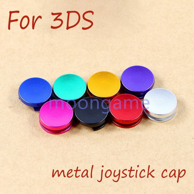 4 Stück Ersatz Metall Joystick Analog Thumb Pad Kappen für Nintendo 3DS, 3DS XL und 3DS LL in Grün und Multicolour - Bild 1